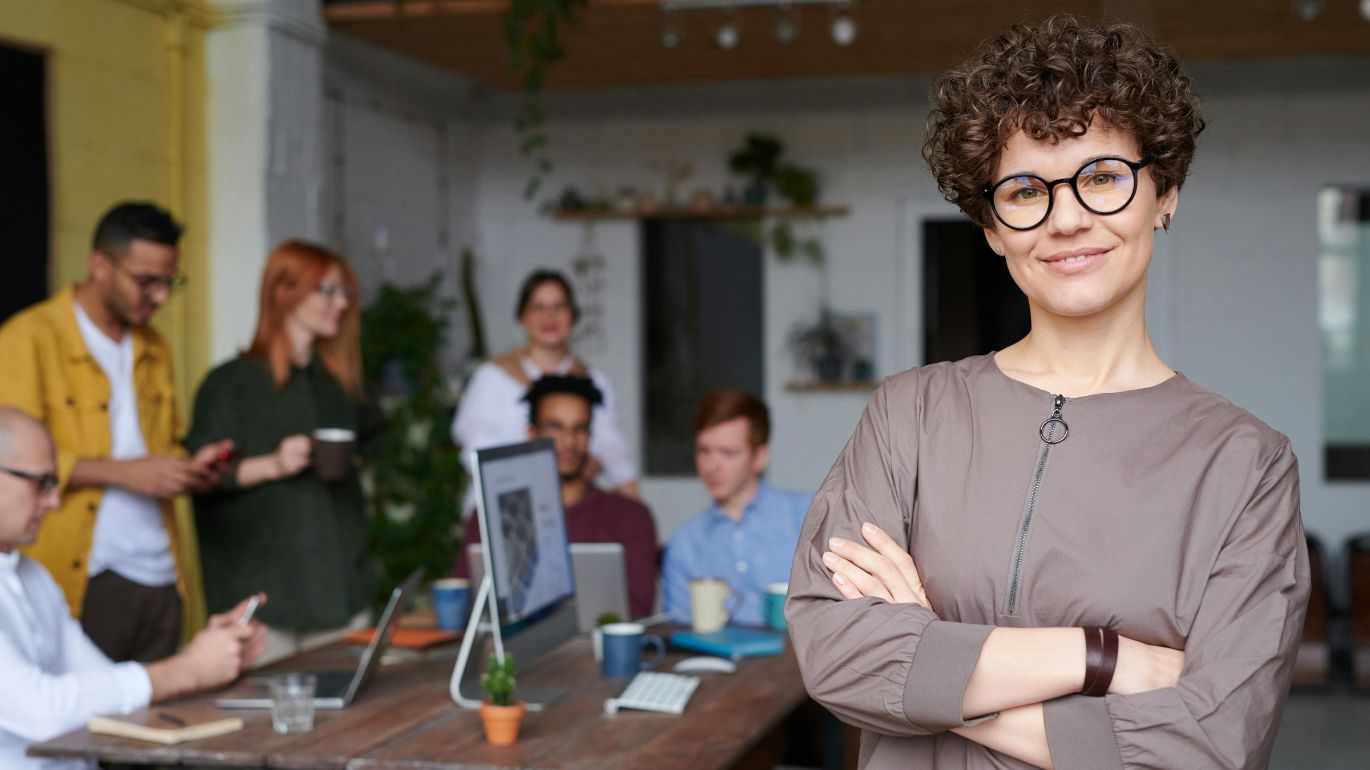 Two colleagues reviewing a tablet